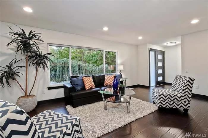 Bright interior common area with seating and plants