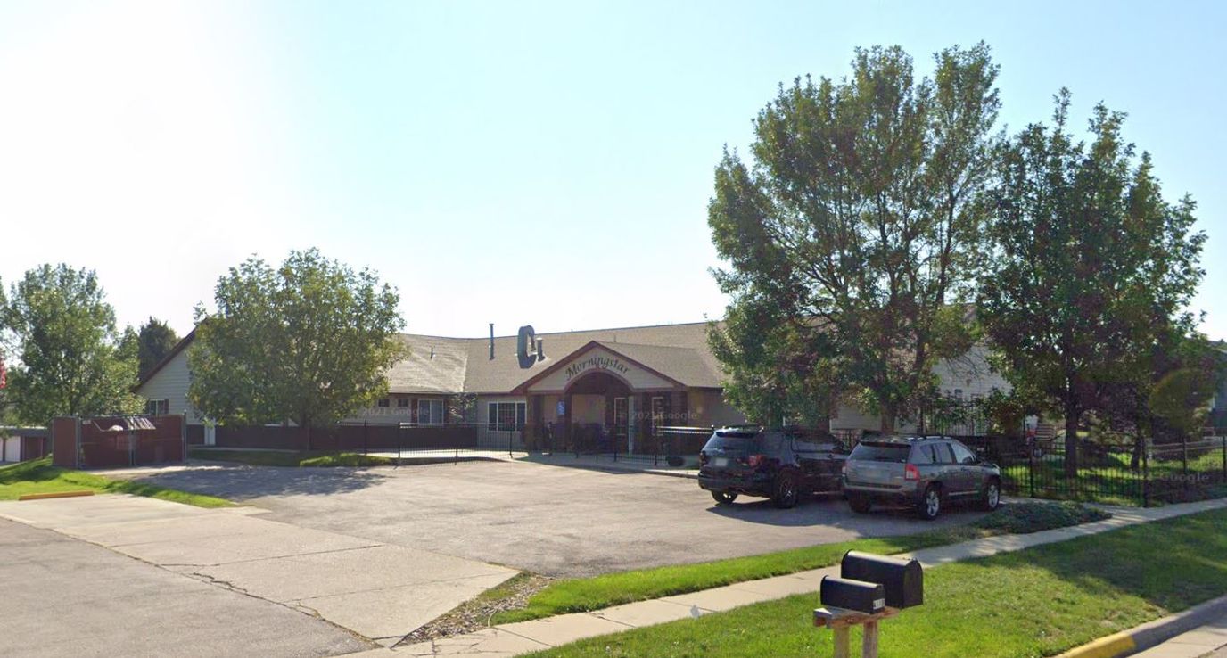 Exterior view of Morningstar Assisted Living building and parking