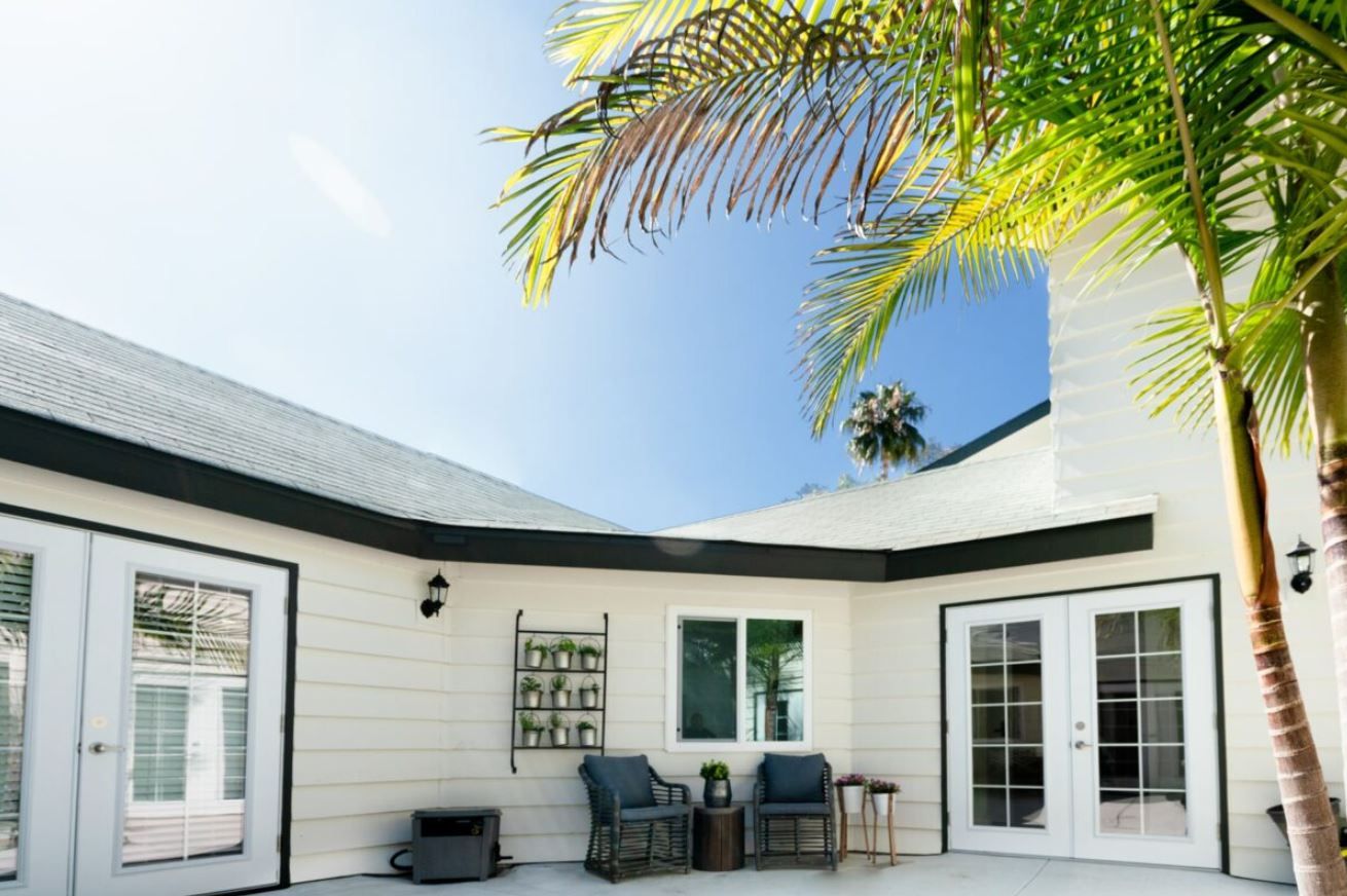 Outdoor space with bright sunlight and seating area