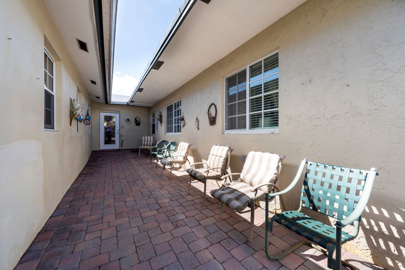 Outdoor patio area with chairs for residents
