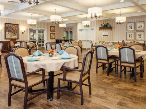 Bright and welcoming dining area with tables set for meals