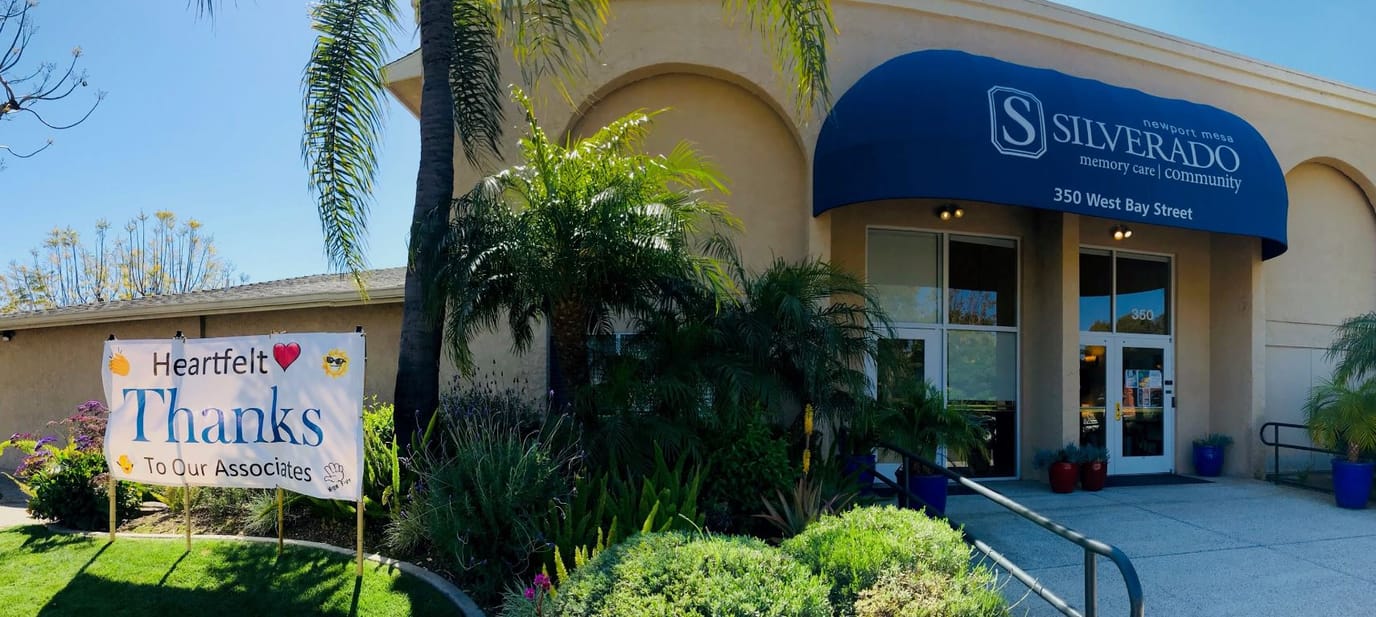 Exterior view of Silverado Newport Mesa with welcoming sign