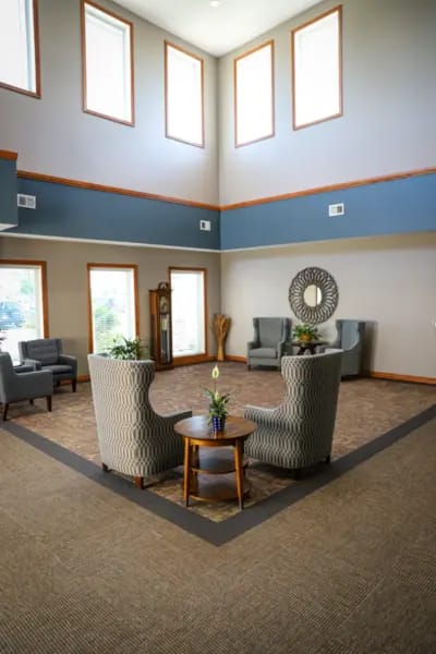 Bright common area with seating and decor