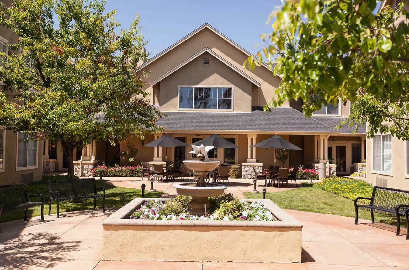 Outdoor courtyard with seating and a fountain