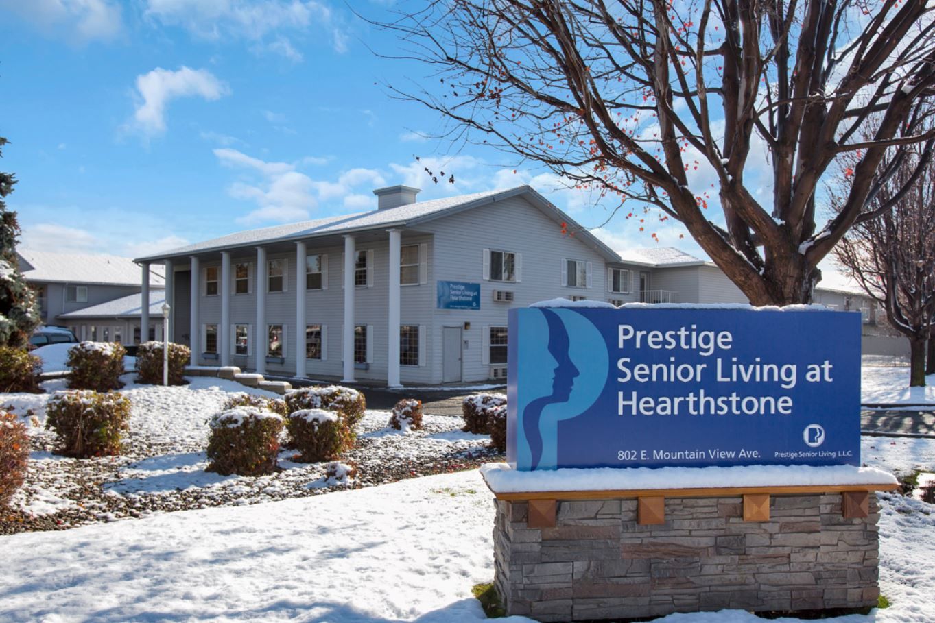 Exterior view of Prestige Senior Living at Hearthstone building