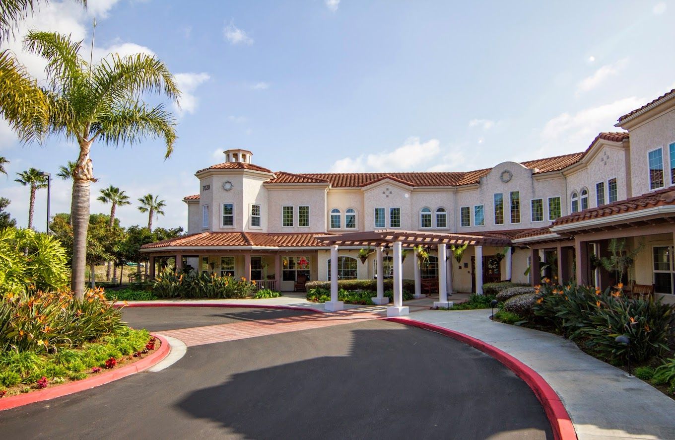 Exterior view of Sunrise at La Costa with gardens and entrance