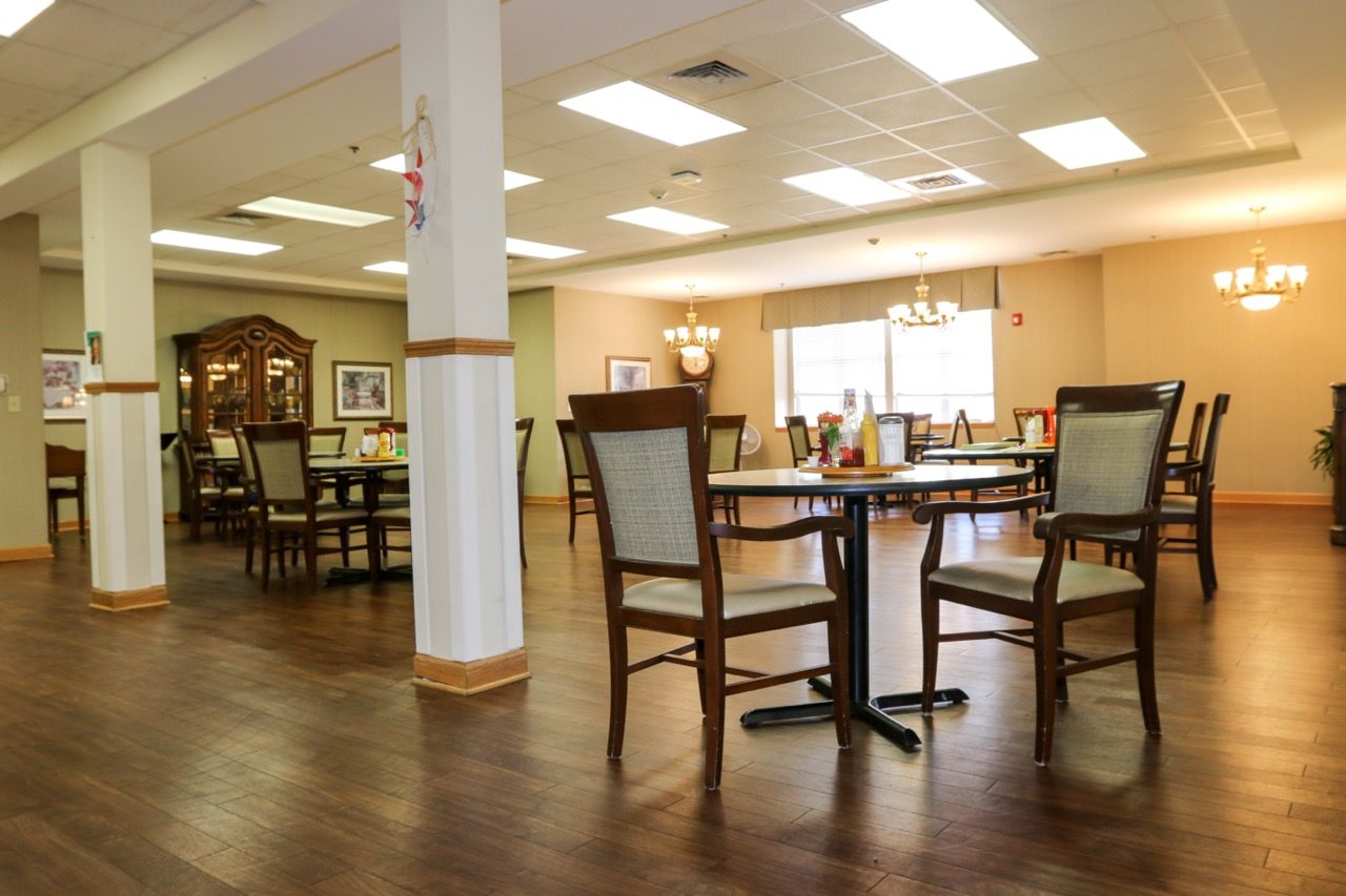 Spacious dining area with dining tables and chairs