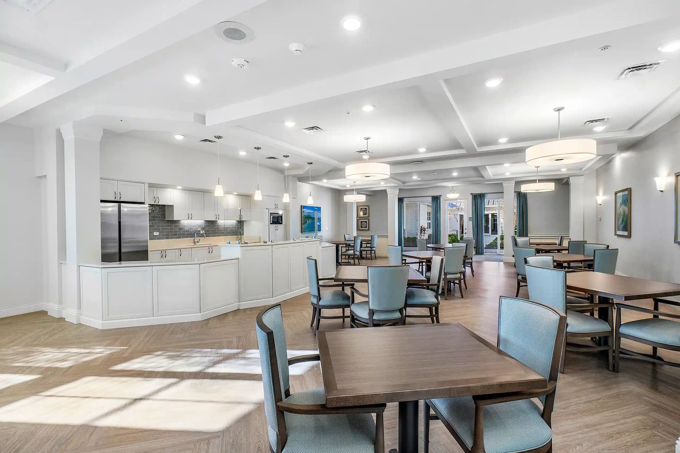 Bright interior common area with tables and chairs