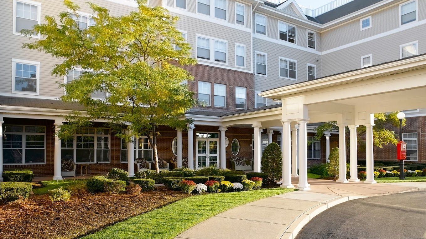Exterior view of Atria Marina Place with landscaping