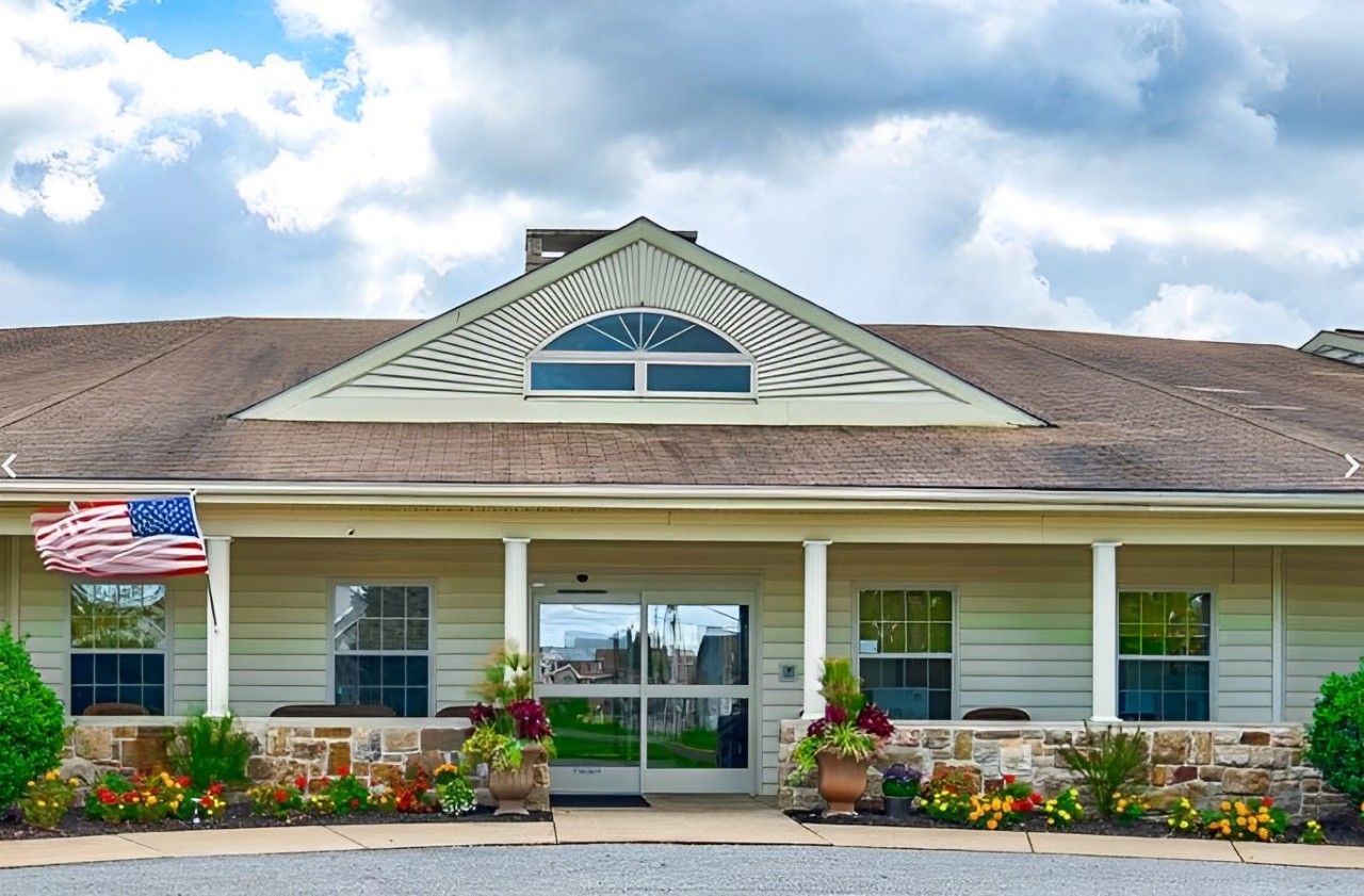 Exterior view of Juniper Village at Lebanon with landscaped entrance