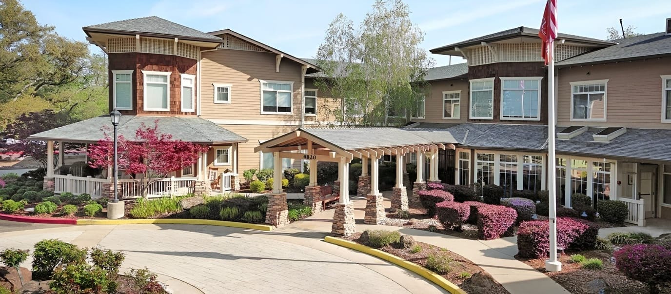 Exterior view of Sunrise at Fair Oaks with landscaped gardens