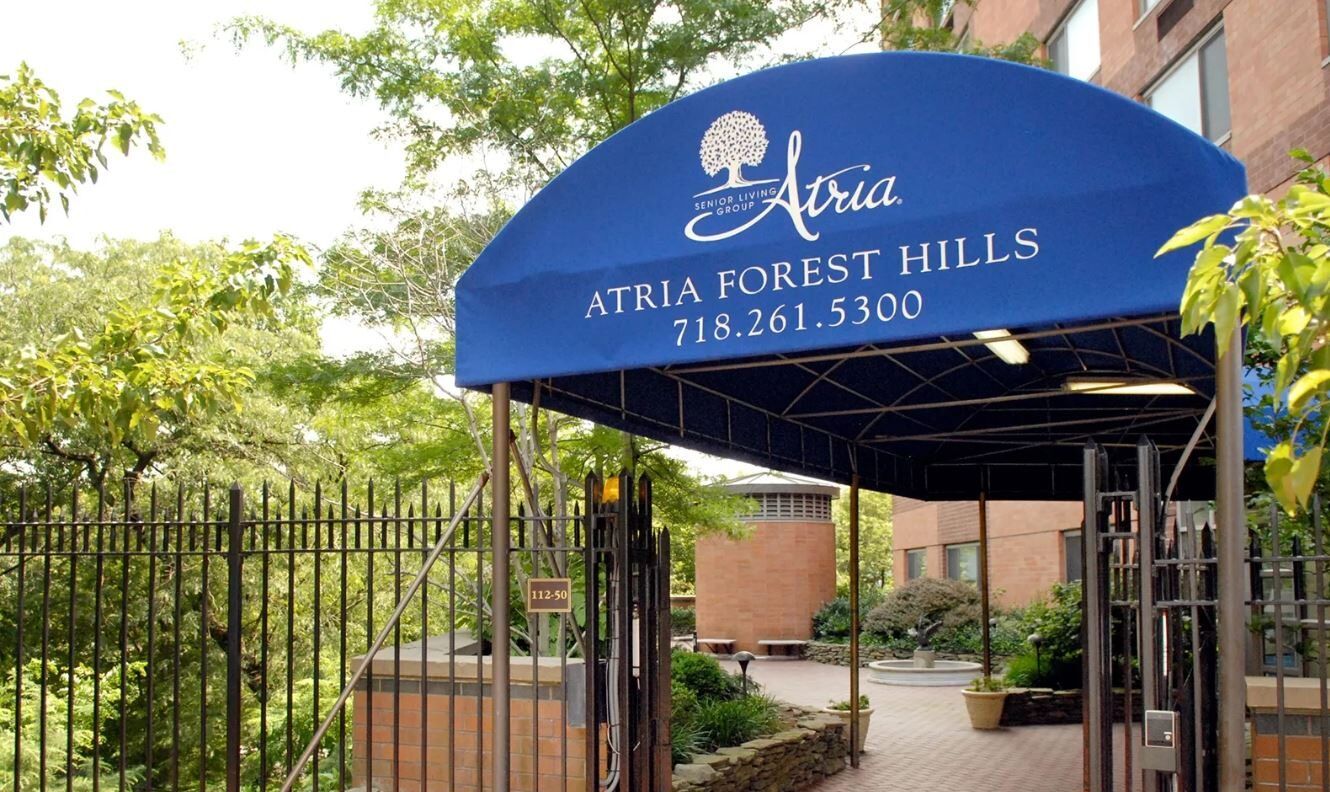 Entrance canopy of Atria Forest Hills facility