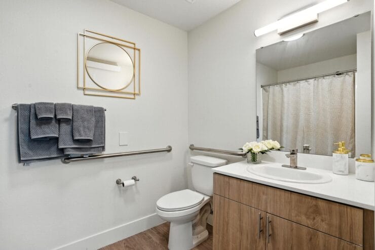 Clean bathroom with toiletries and towels.