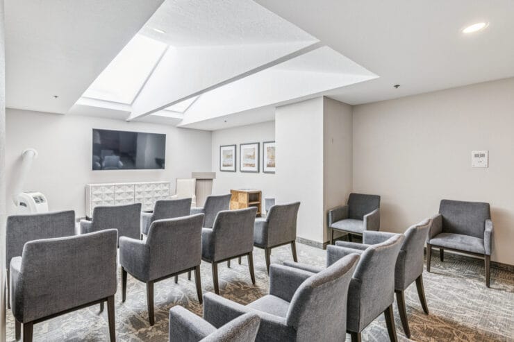 Common area with seating and a TV.