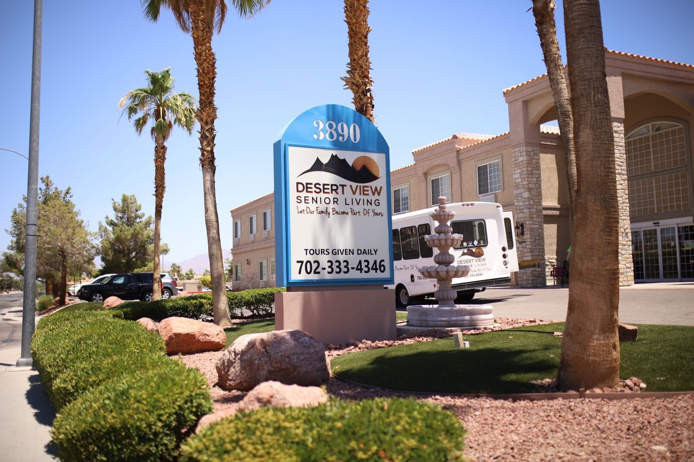 Exterior view of Desert View Senior Living facility with sign