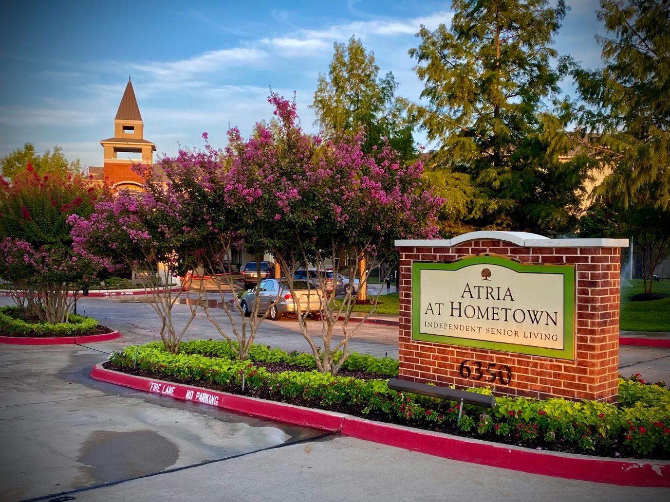 Exterior view of Atria at Hometown with landscaping