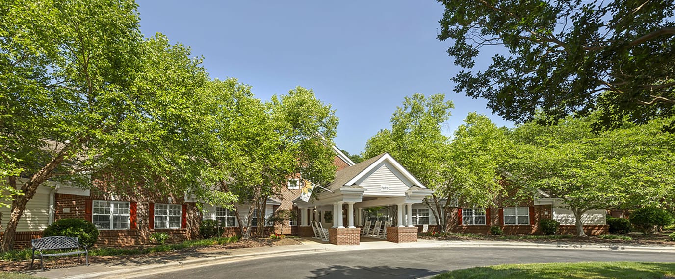 Exterior view of Brookdale Cary with landscaped surroundings