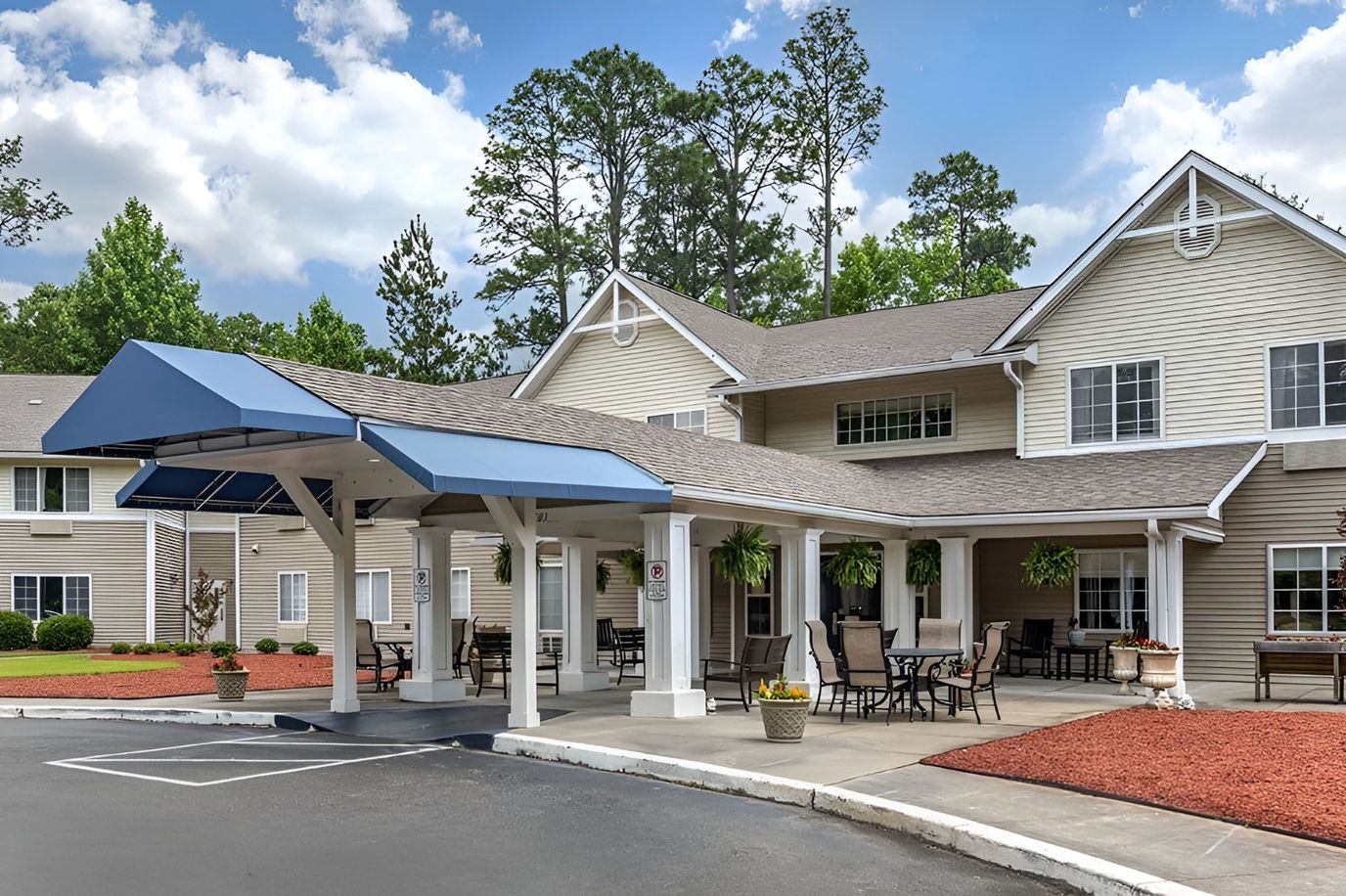 Front entrance of an assisted living facility with a canopy