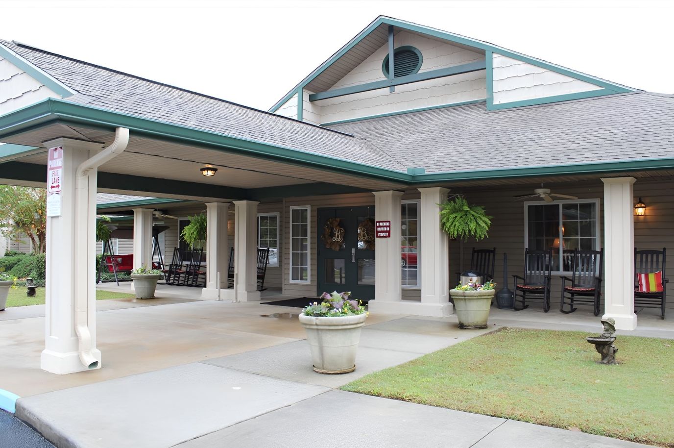 Front entrance of Brookdale Meridian with rocking chairs