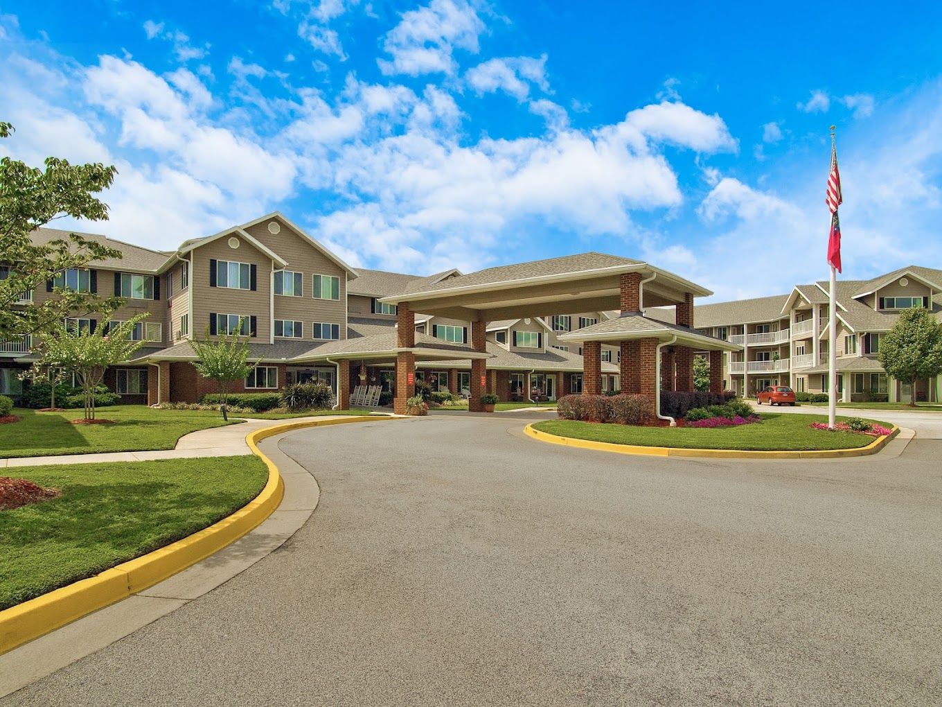 Exterior view of Holiday Pinegate with landscaped entrance