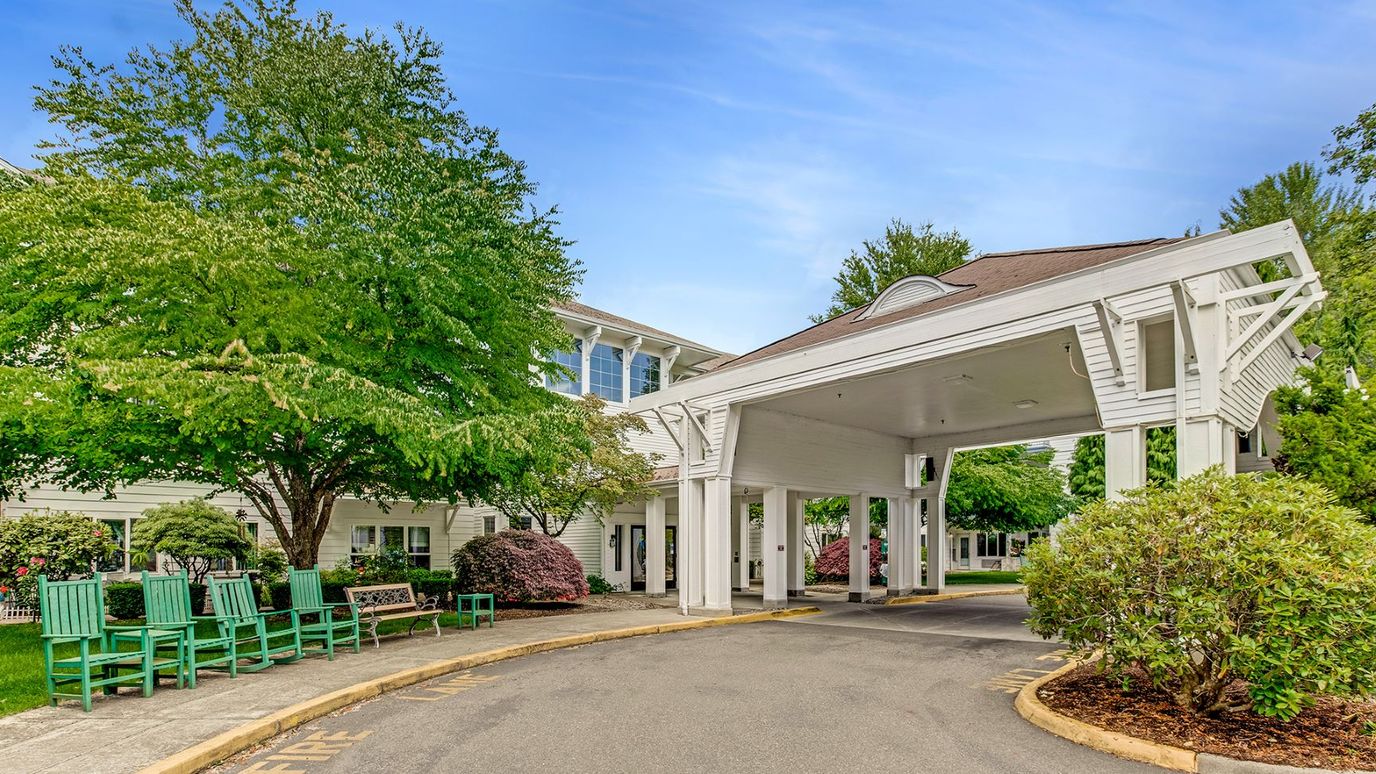 Exterior view of the facility entrance with landscaped surroundings