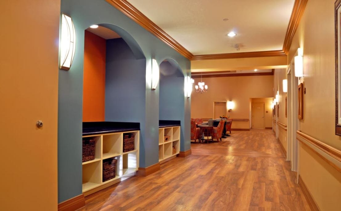 Interior hallway with shelves and seating area