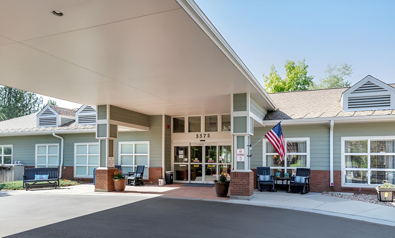 Entrance of Brookdale Boulder Creek facility with American flag