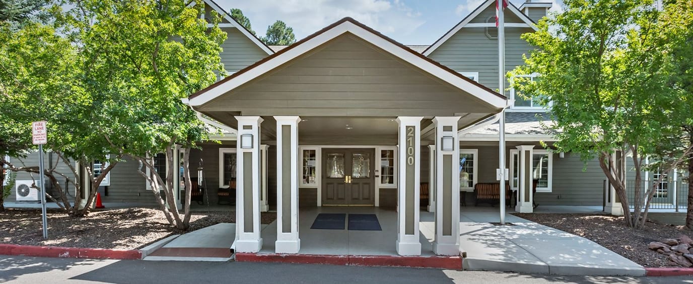 Front entrance of Brookdale Flagstaff with landscaping