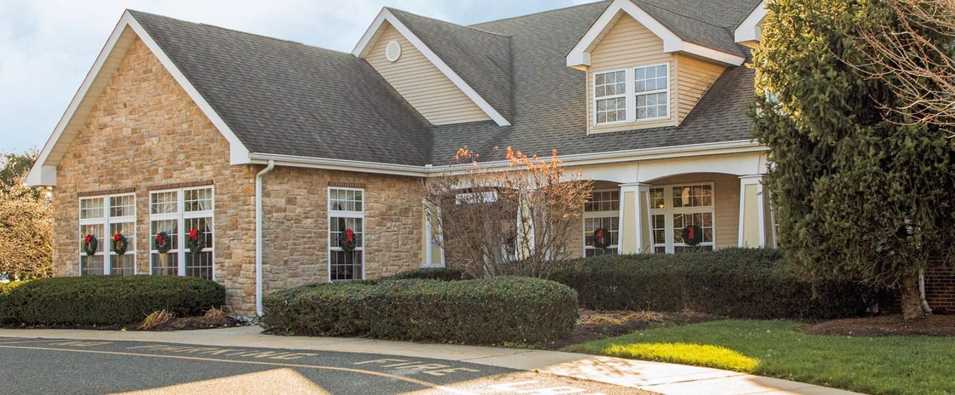 Exterior view of Brookdale Florence facility decorated for the holidays