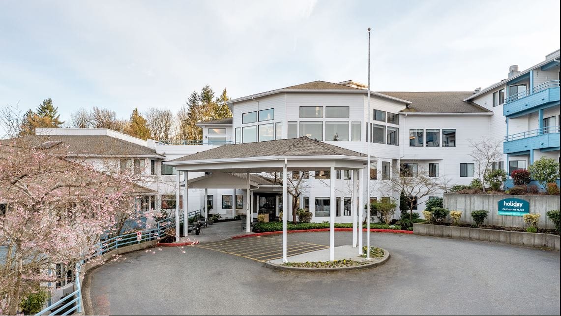 Front view of the assisted living facility with outdoor space