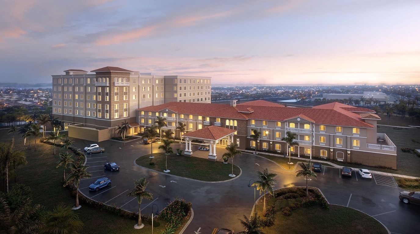 Aerial view of the Chateau Madeleine building at dusk