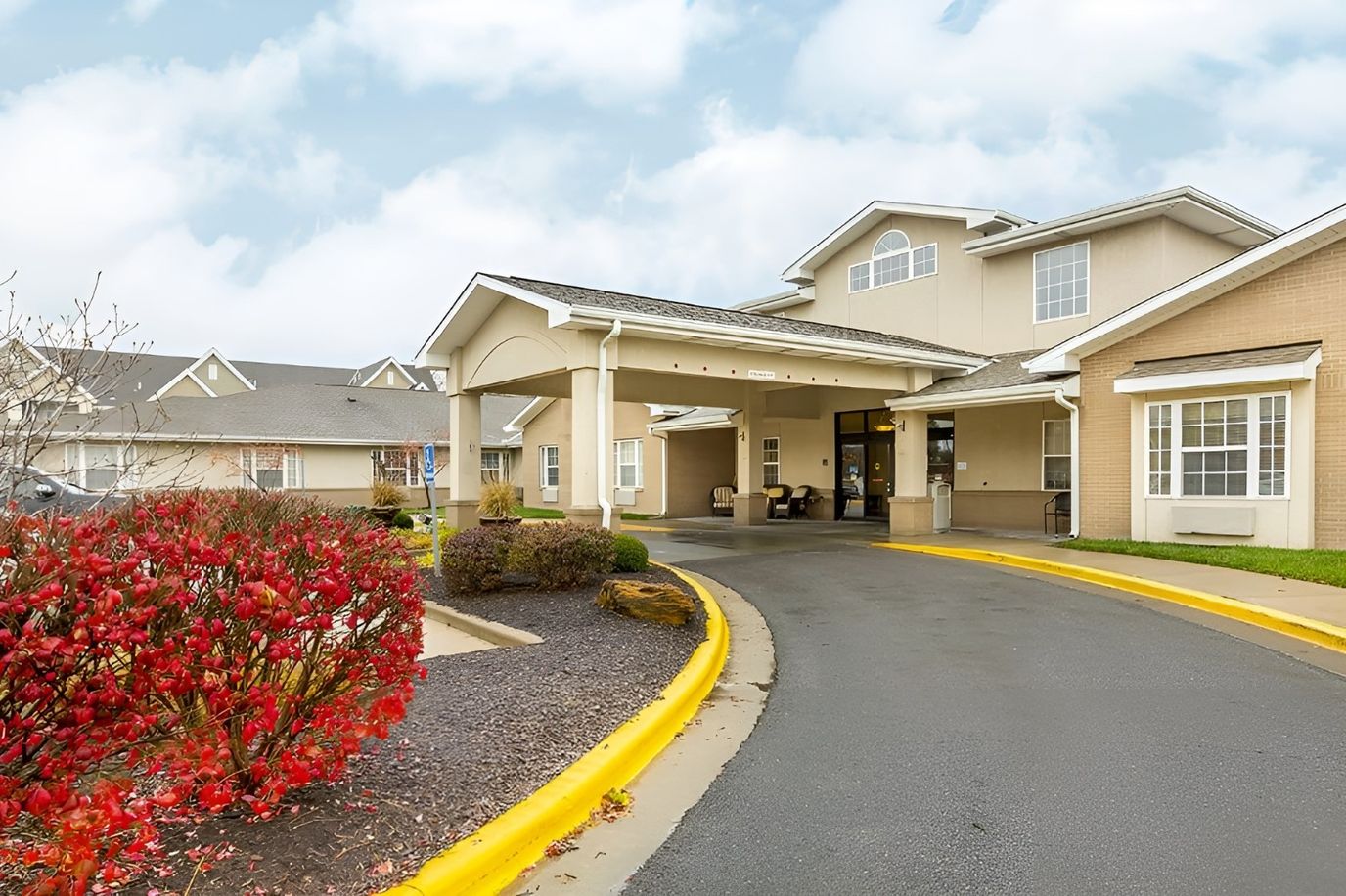 Front entrance of Brookdale Rosehill with landscaped path