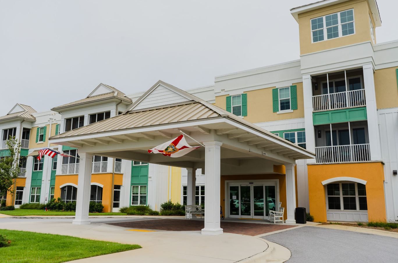 Exterior view of The Arbors Gulf Breeze building entrance