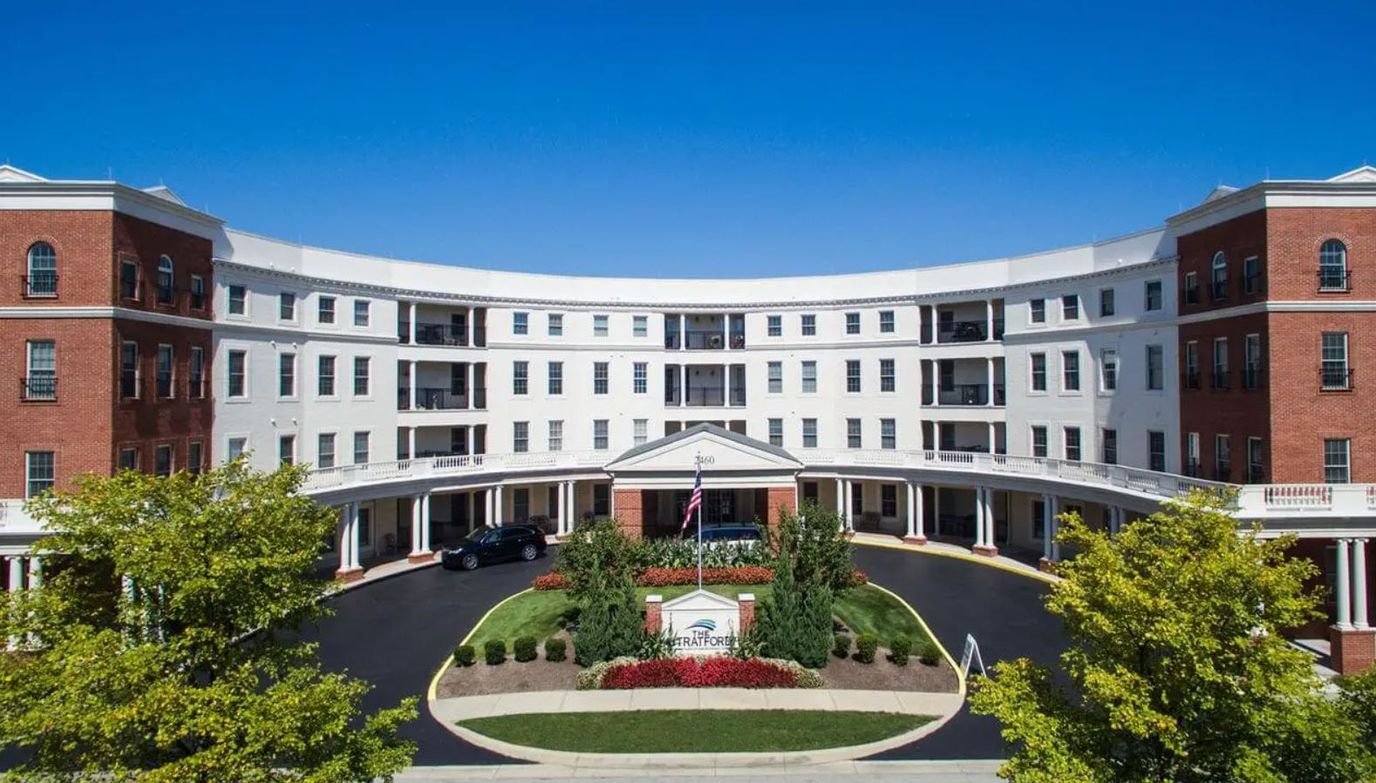 Exterior view of The Stratford nursing home with landscaping
