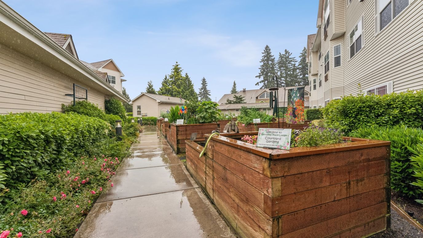 Garden area with raised planters and walking path