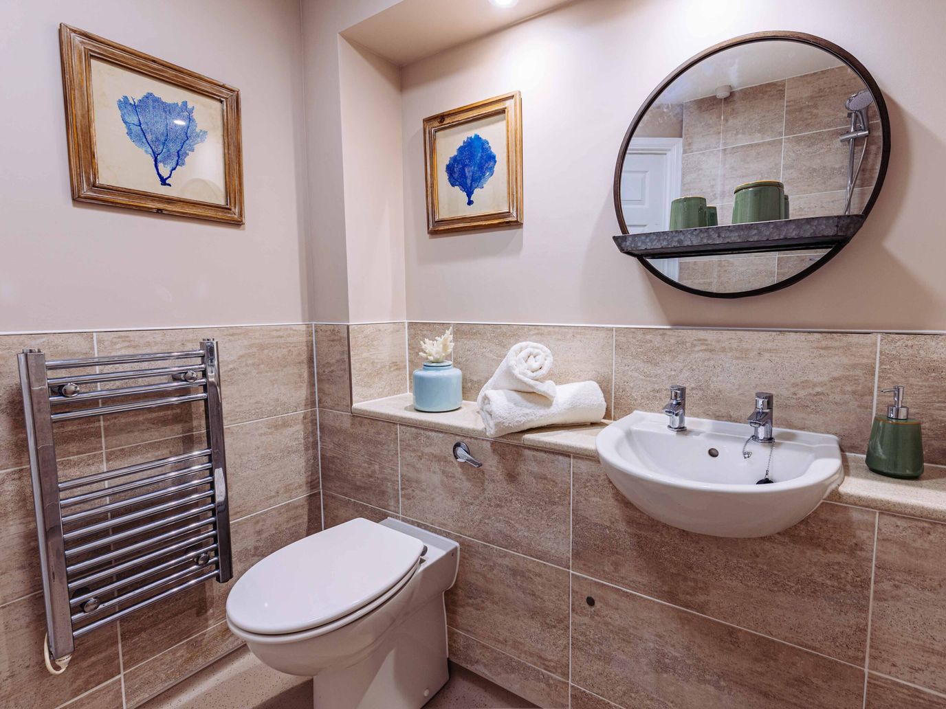 Clean and modern bathroom with decorative elements.