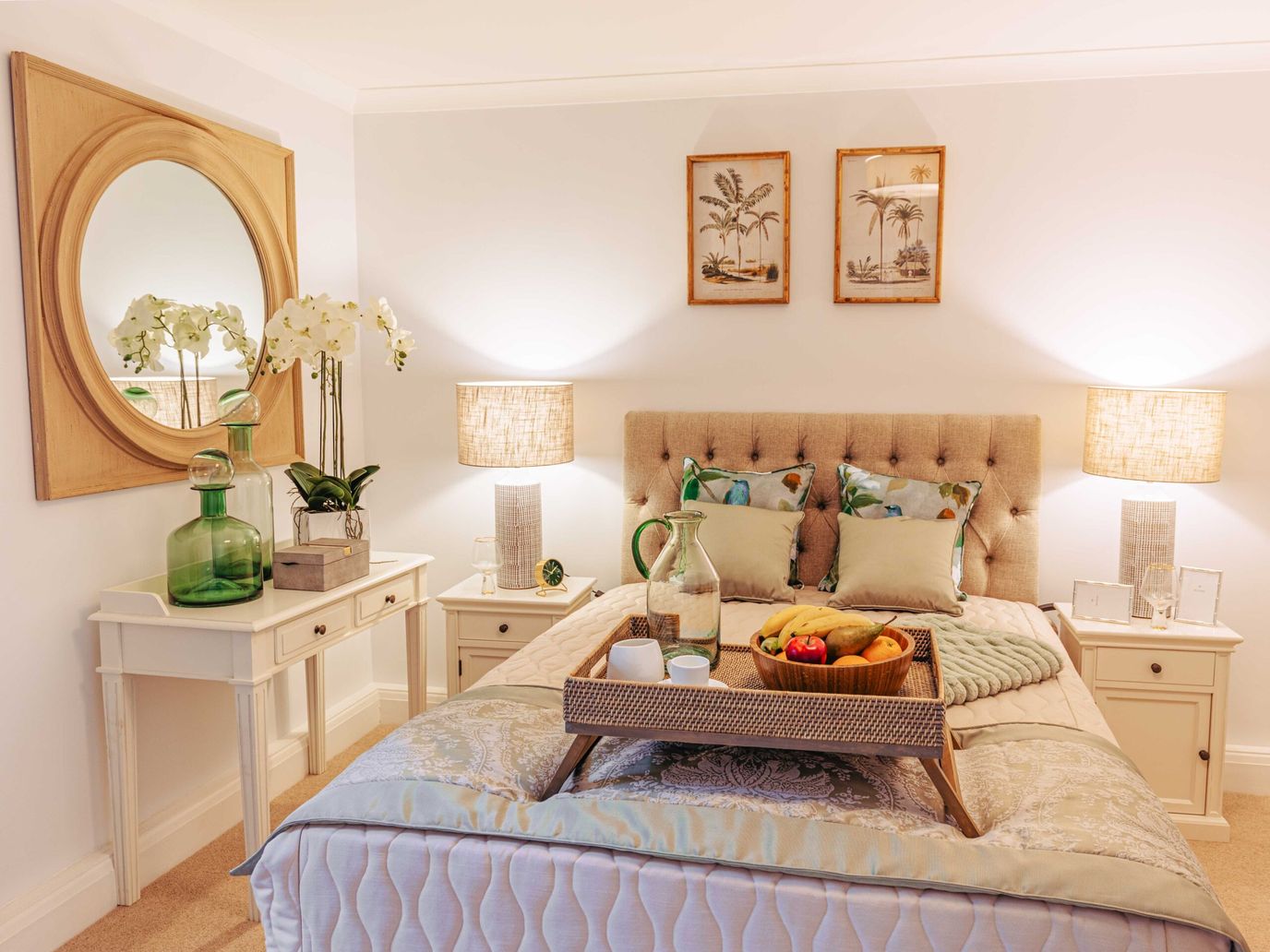 Stylish private room with decor and fruit tray.