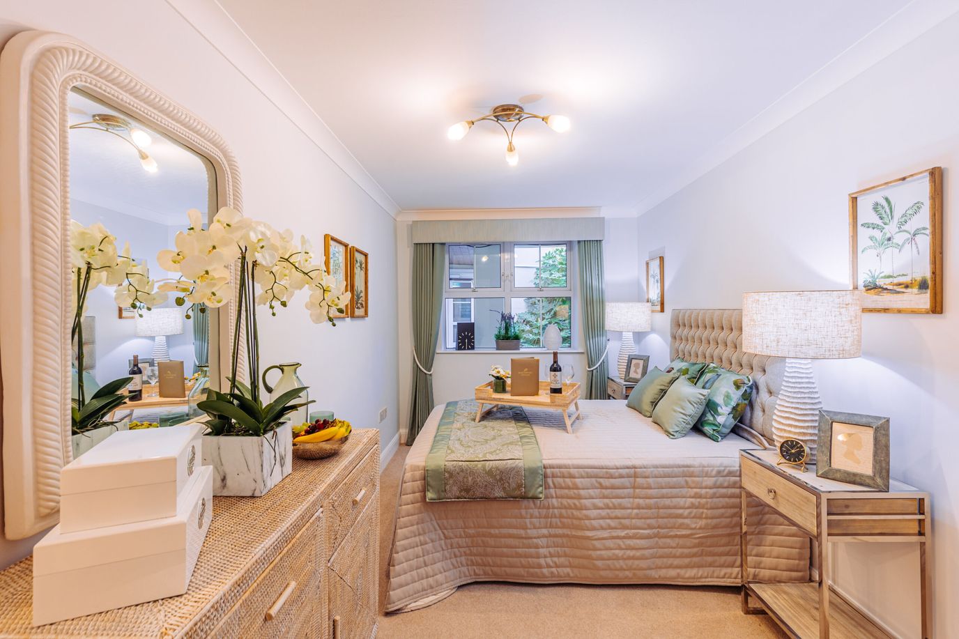 Cozy private bedroom with elegant decor and plants.