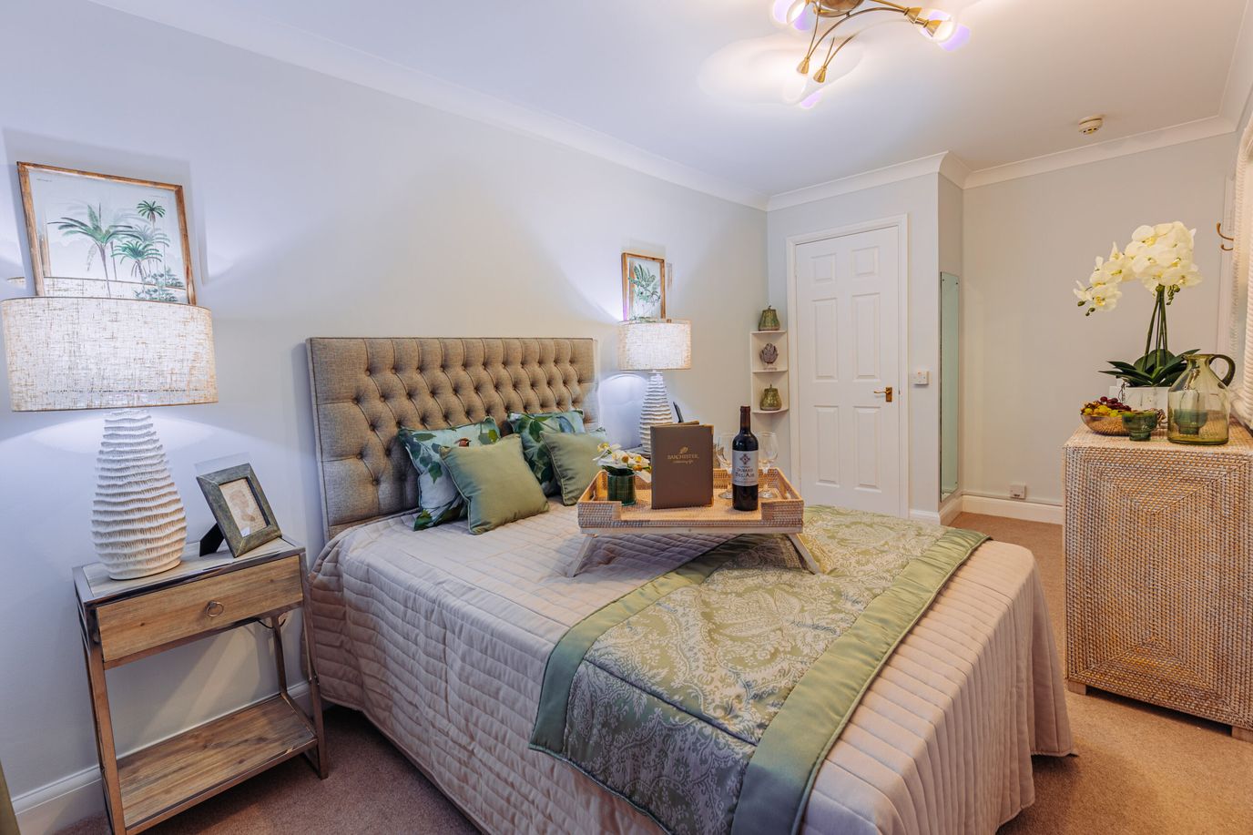 Cozy bedroom set up with decorative elements.
