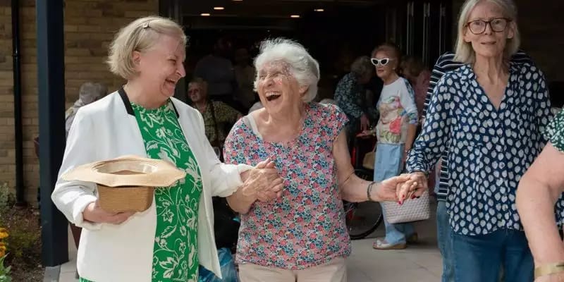 Residents enjoying a joyful moment together.