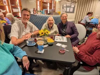 Residents enjoying time together in a common area.