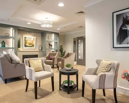 Cozy common area with seating and artwork.