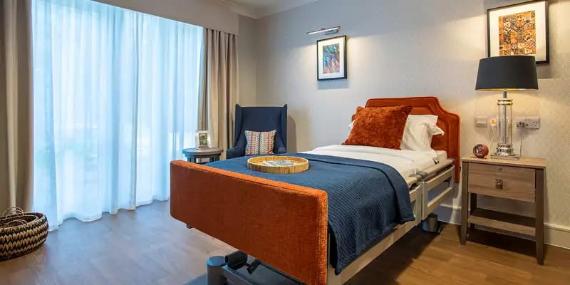 Comfortable resident bedroom with modern decor.