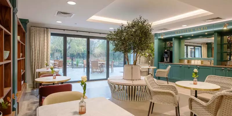 Cozy common area with seating and greenery