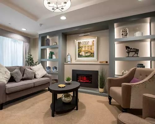 Cozy common area with seating and artwork