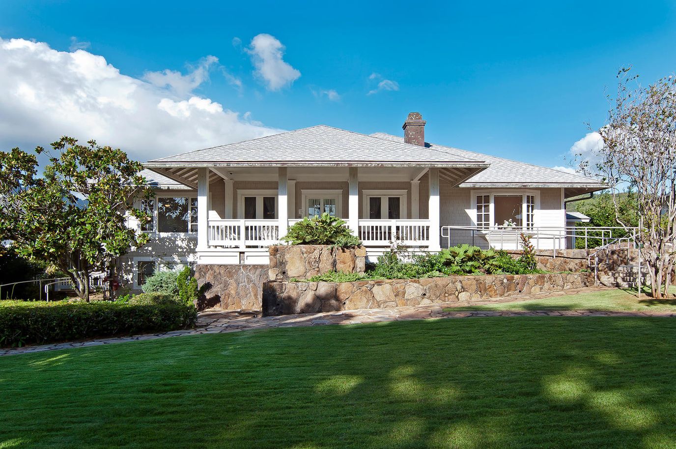Exterior view of a residential building with a garden