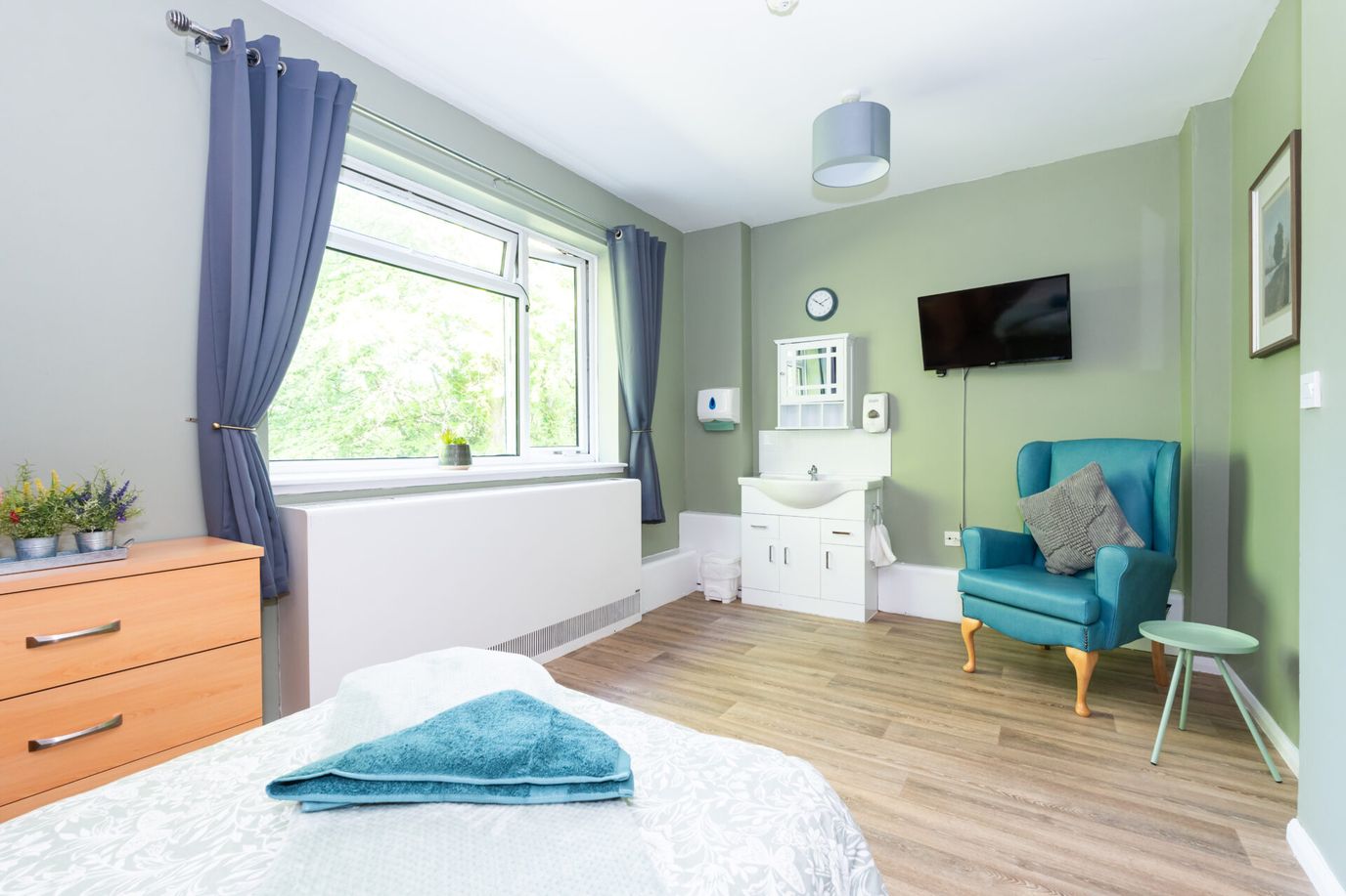 Well-furnished private resident room with natural light