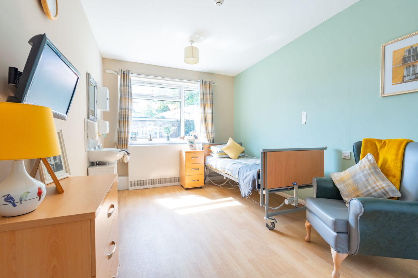 Private resident room with bed and seating