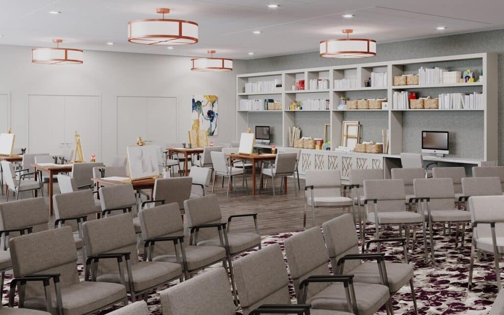 Bright activity room with chairs arranged for an event
