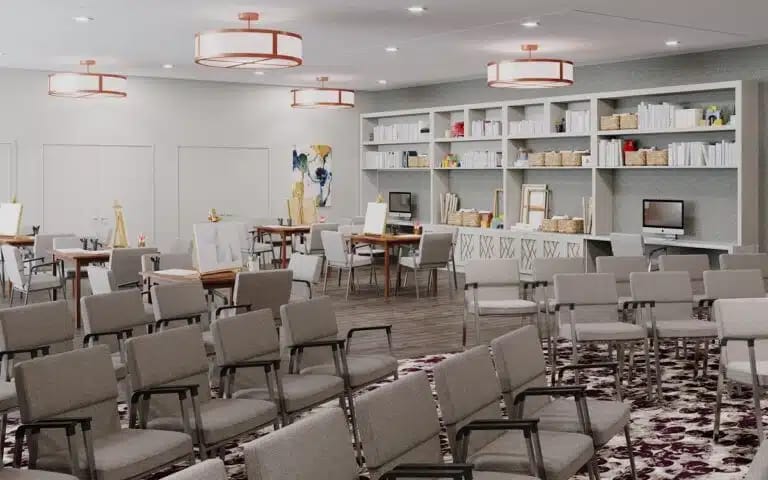 Bright activity room with seating and shelves